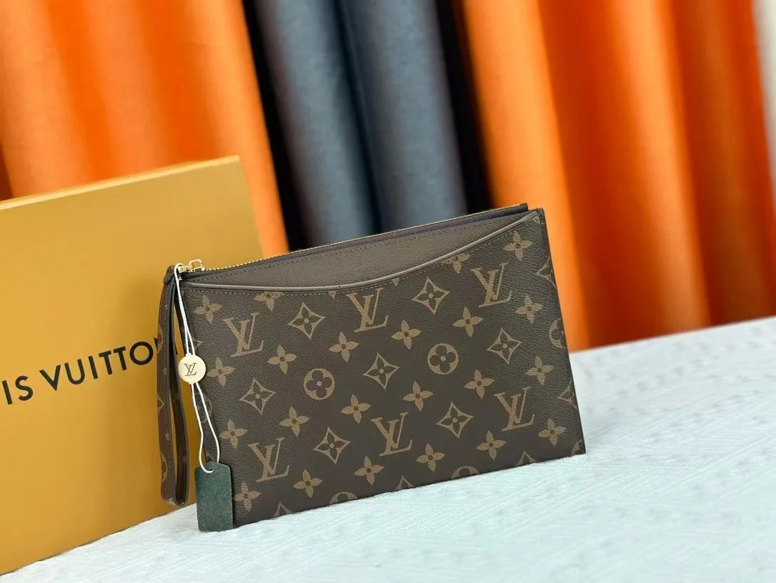 Louis Vuitton Calfskin Wristlet Pouch in Brown · view 1