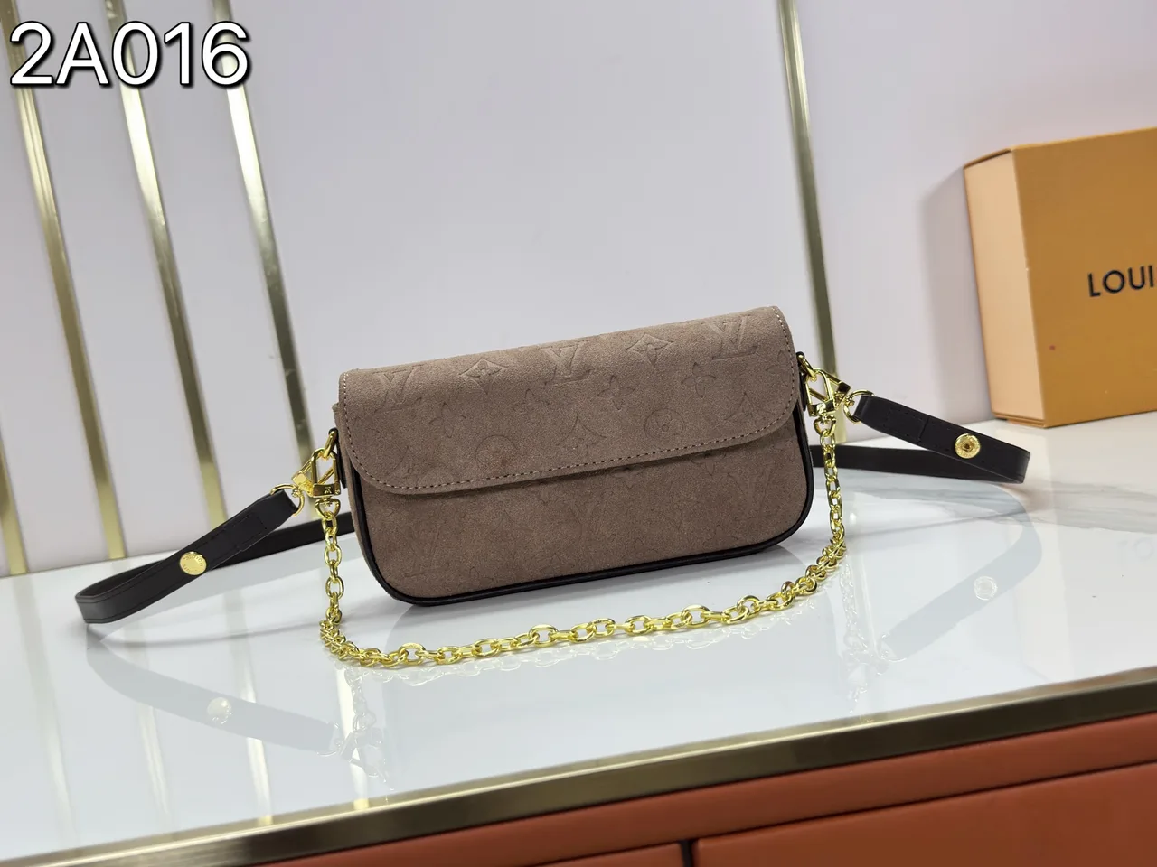 Louis Vuitton Leather Suede-Look Handbag in Brown · view 1