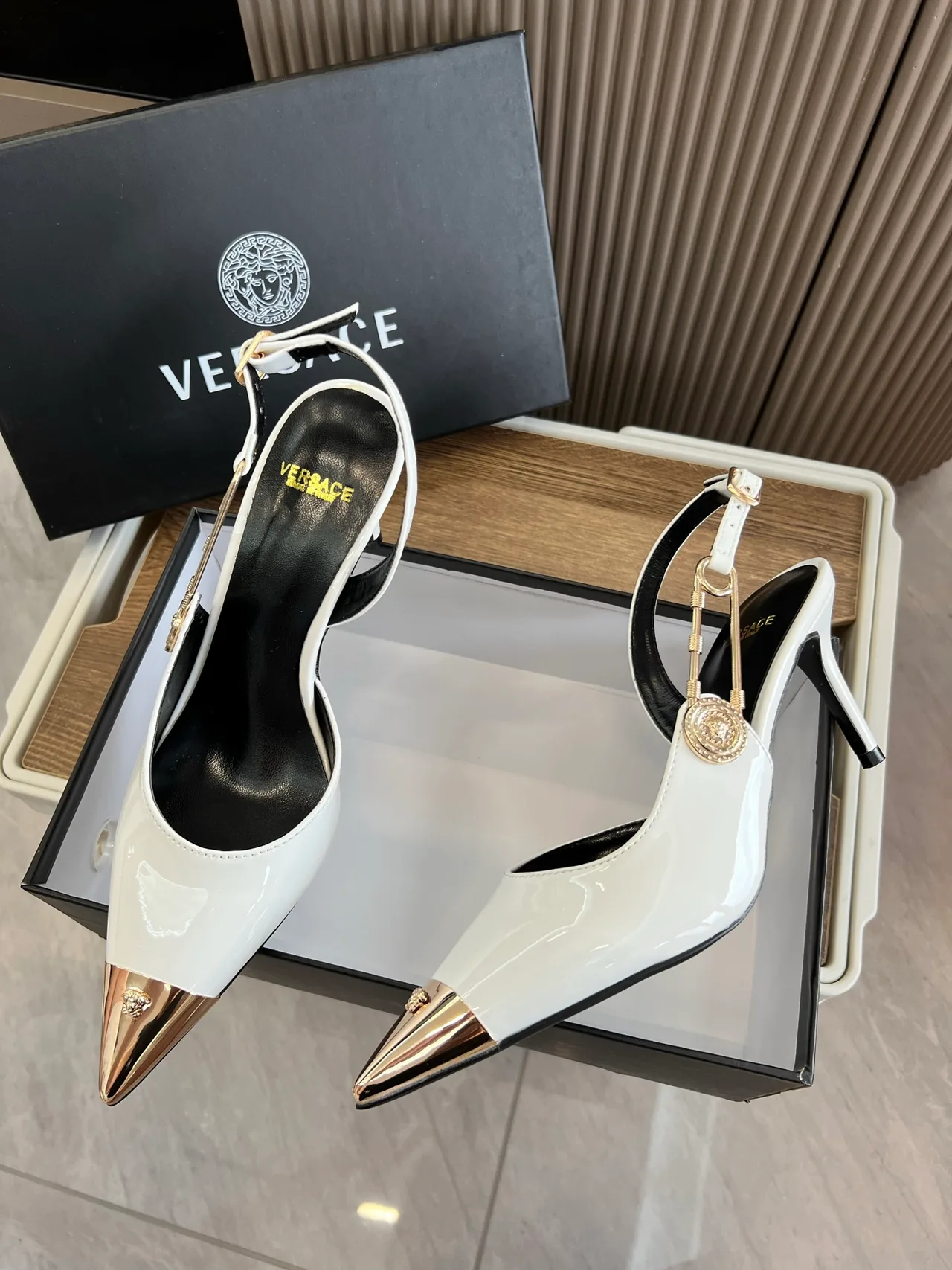 Versace Pointed-Toe Pointed Slingback Pumps in White · view 1