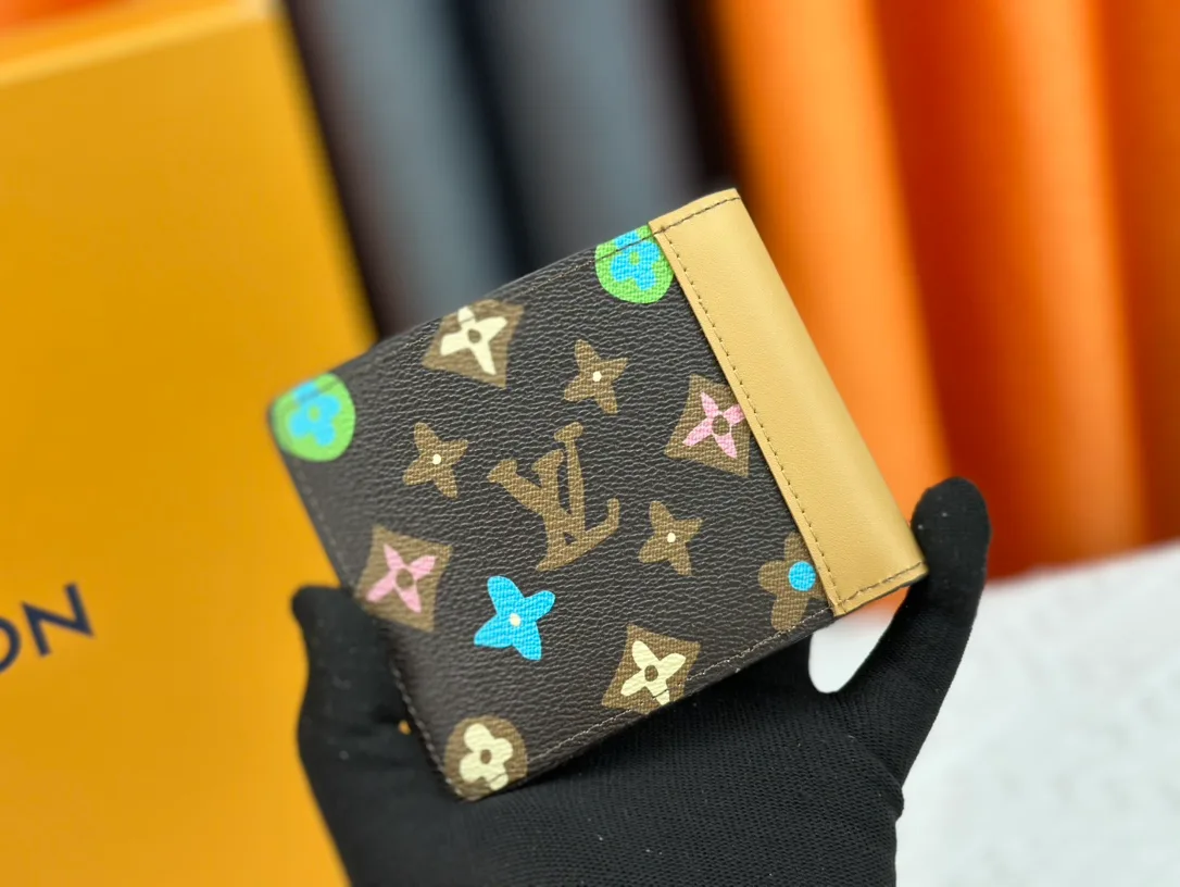 Louis Vuitton Canvas Wallet in Brown · view 2