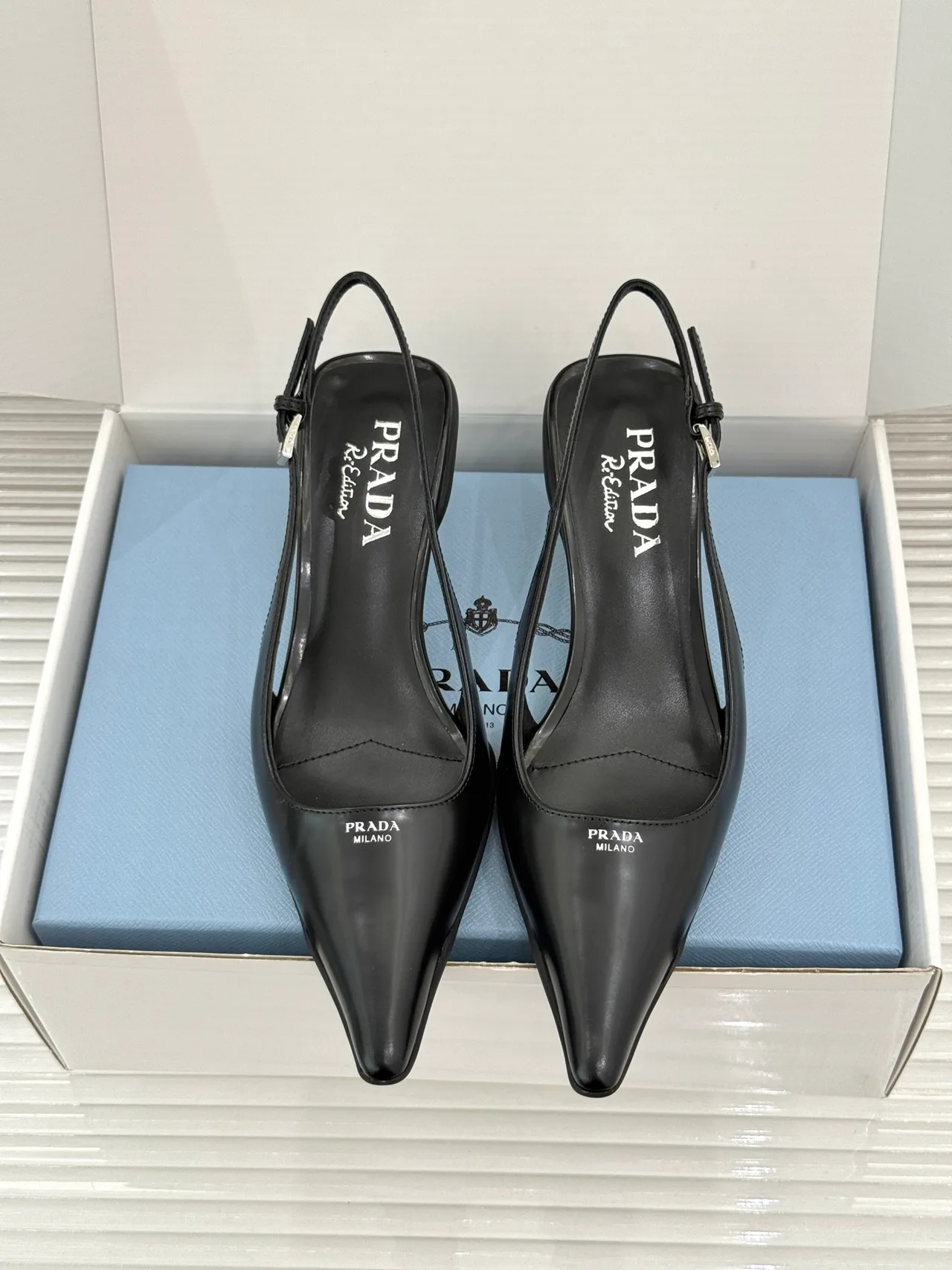 Prada Pointed Slingback Pumps in Black · view 1