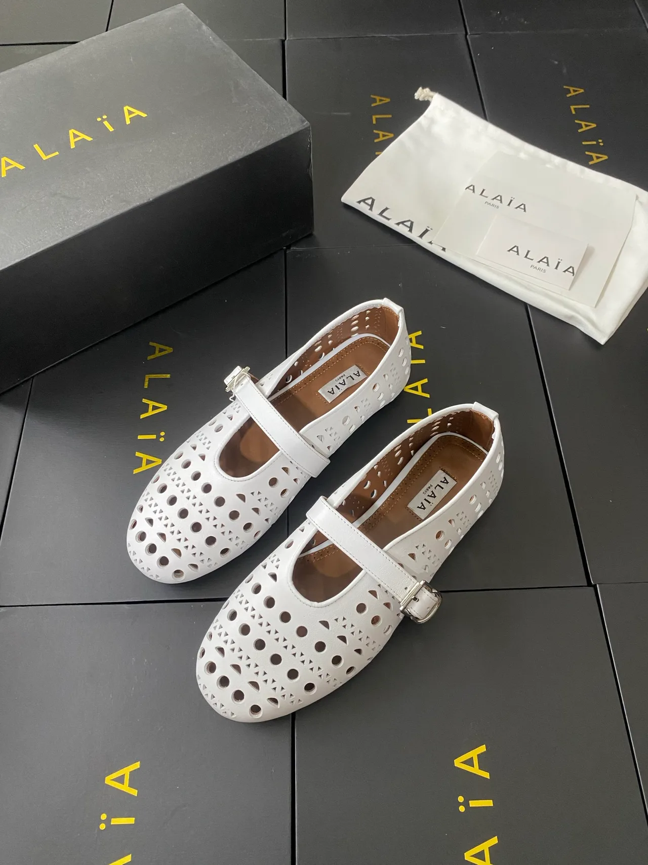 Alaia Cowhide Sheepskin Round-Toe Buckle Ballet Flats in White · view 3