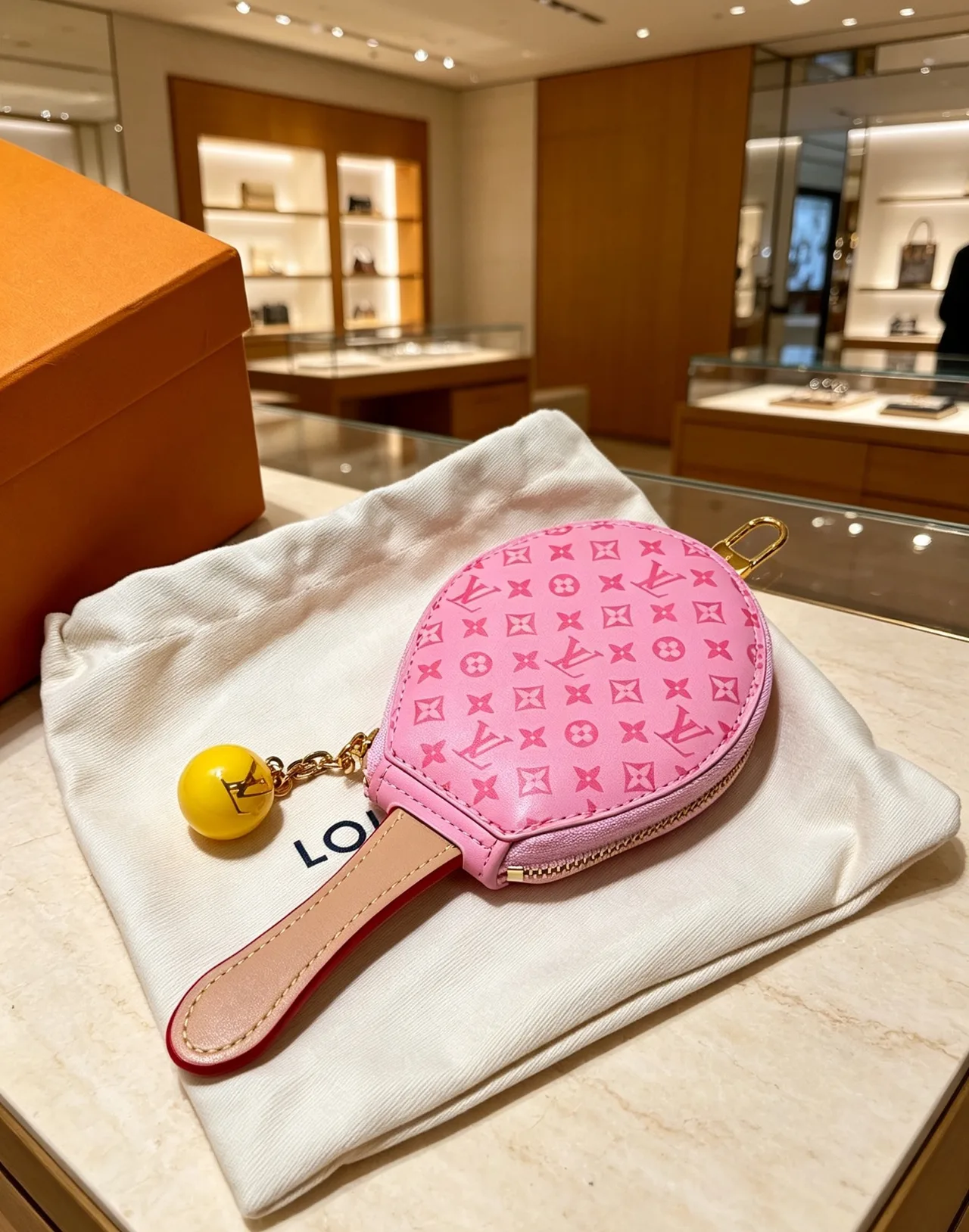 Louis Vuitton Racket-Shaped Coin Pouch in Brown & Red & Pink · view 4