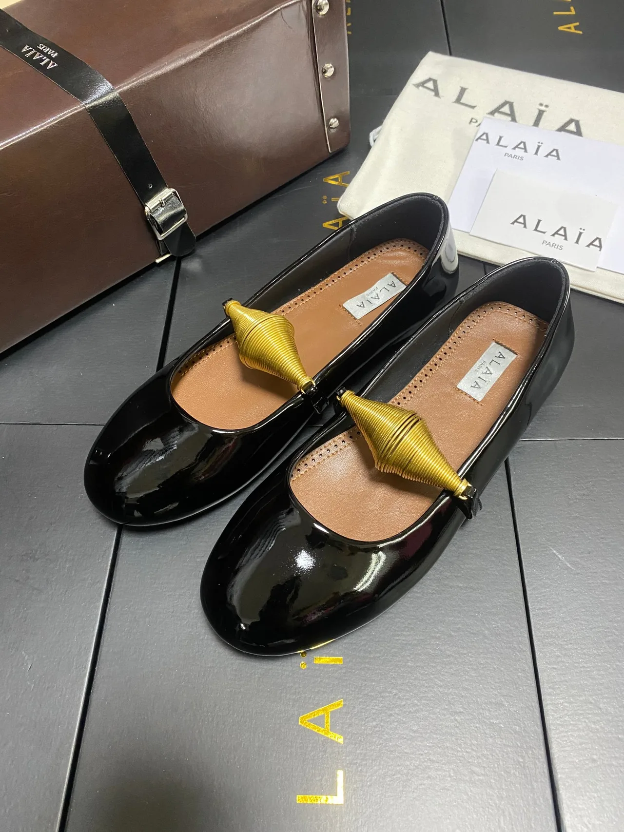 Alaia Cowhide Sheepskin Glossy Square-Toe Mary Jane Flats in Black · view 3