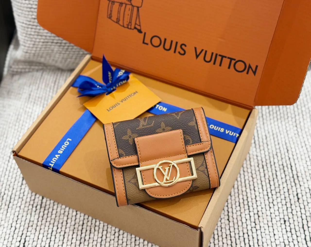 Louis Vuitton Wallet in Brown & Blue & Black · view 1