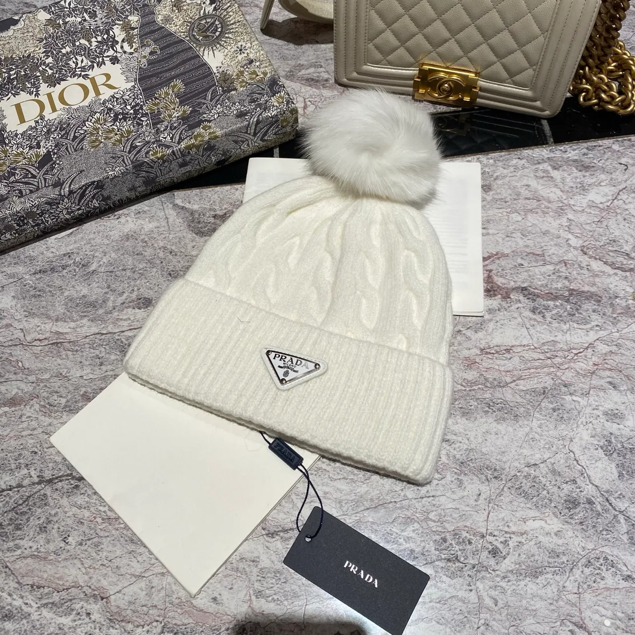 Prada Cable knit pom beanie in Black & White & Grey & Brown & Cream & Blue & Burgundy & Pink · view 2