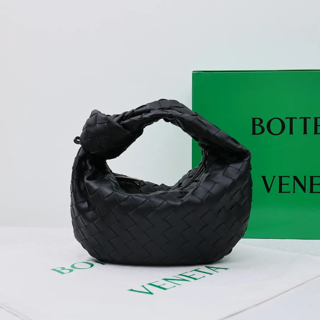Sheepskin Quilted Knotted Woven Hobo Bag in Black · view 1