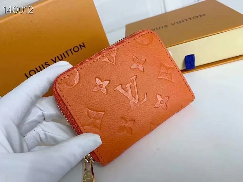 Louis Vuitton Zip Coin Wallet in Orange · view 4