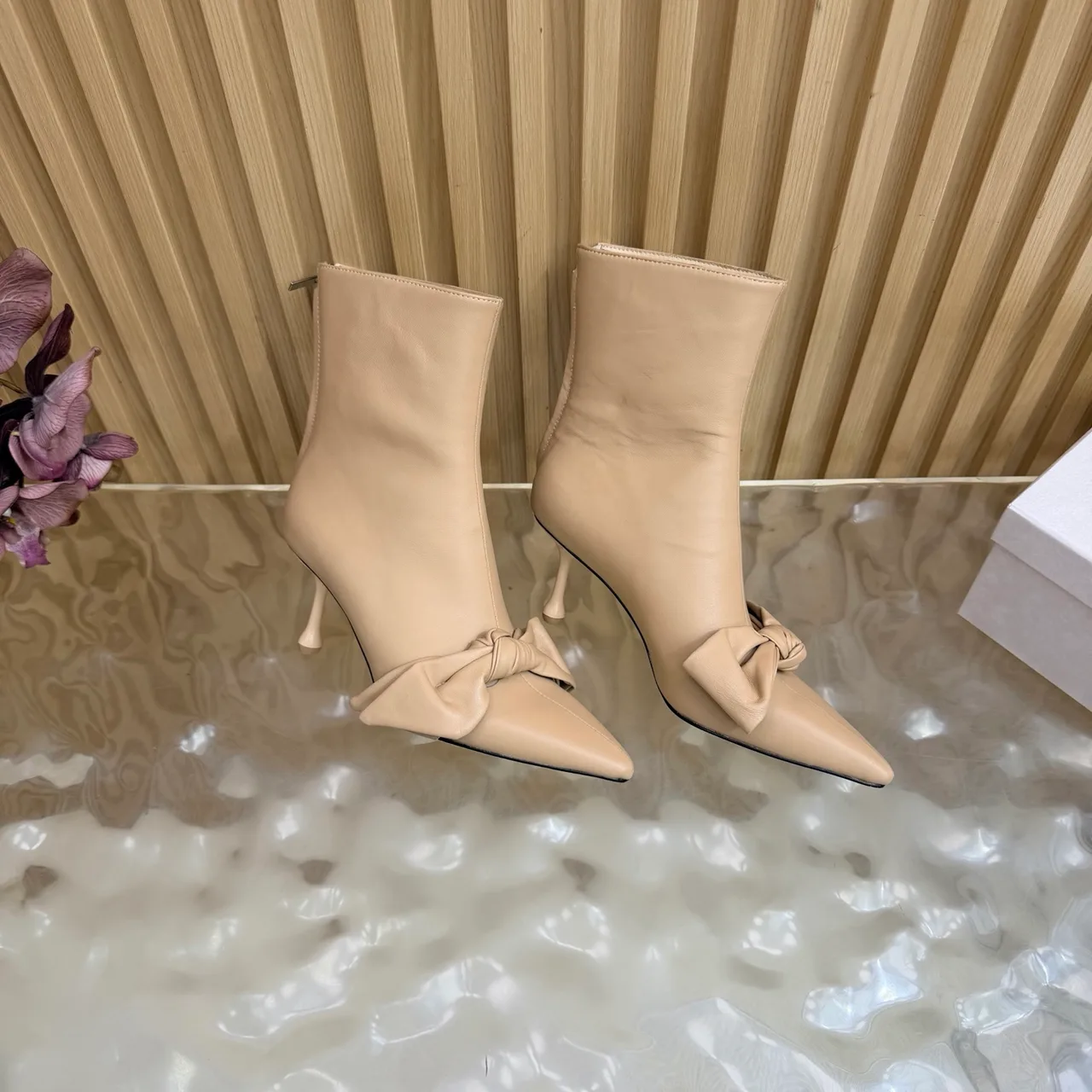 Jimmy Choo Cowhide Glossy Pointed-Toe Bow Ankle Boots in Beige · view 7