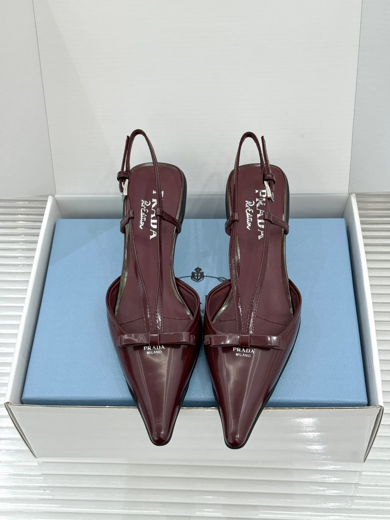 Prada Lambskin Pointed Slingback Pumps in Burgundy · view 1