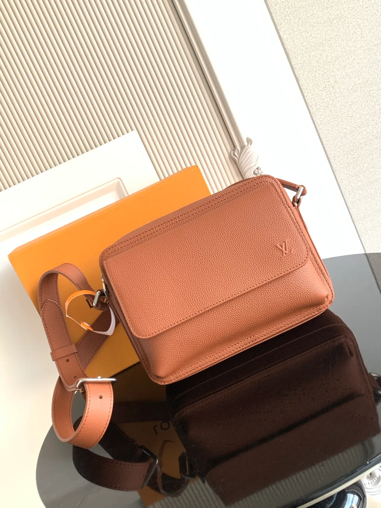 Louis Vuitton Cowhide Messenger Bag in Brown · view 1