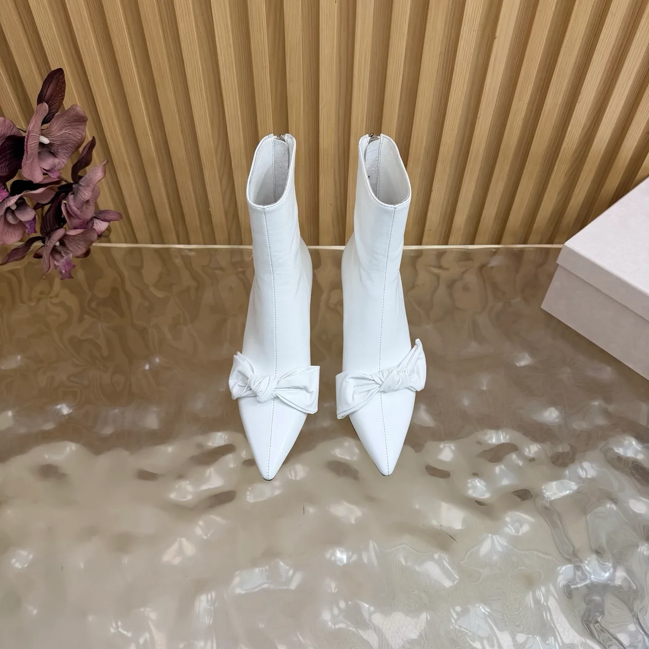 Jimmy Choo Cowhide Glossy Pointed-Toe Bow Ankle Boots in White · view 1
