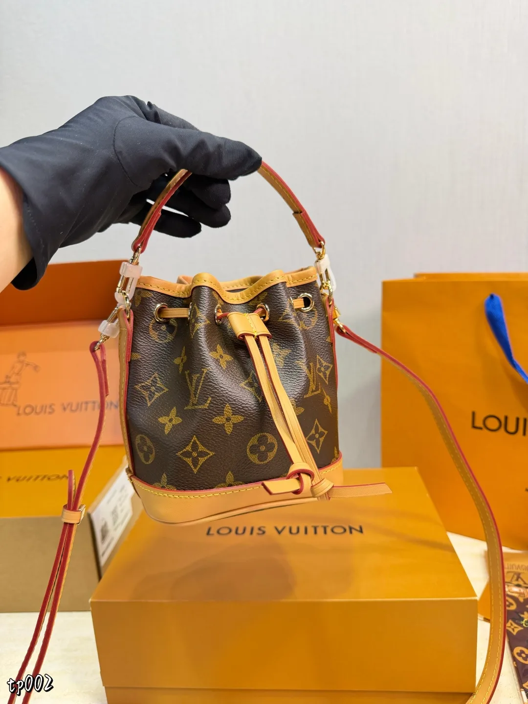 Louis Vuitton Nano Noe Bucket Bag in Brown · view 3