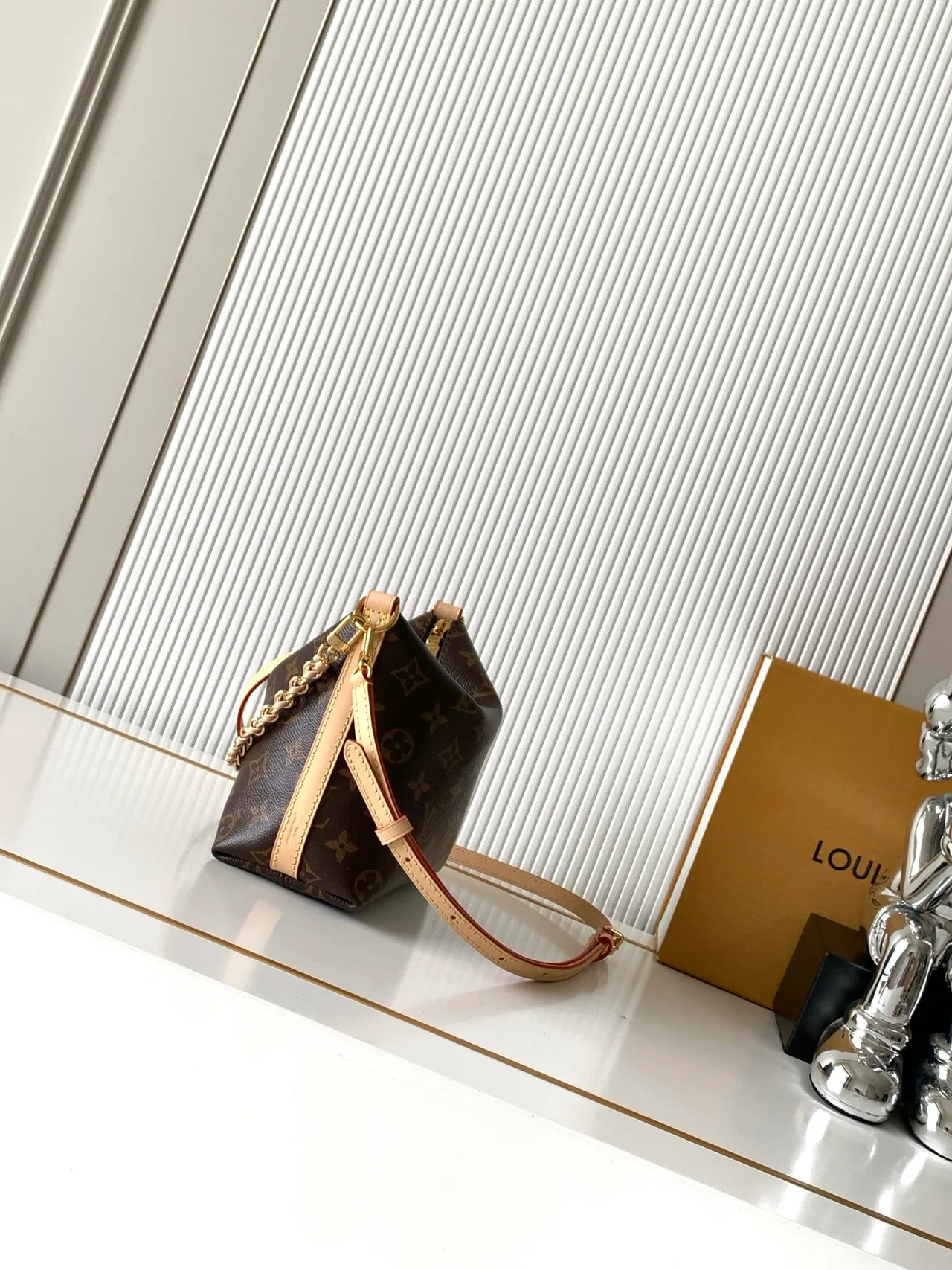 Louis Vuitton Canvas Smooth Hobo Bag in Brown · view 1