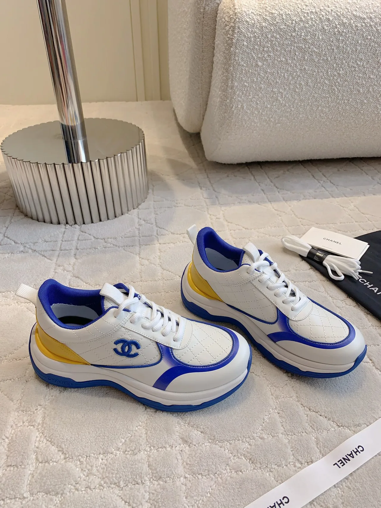 Chanel Quilted Sneakers in White · view 3