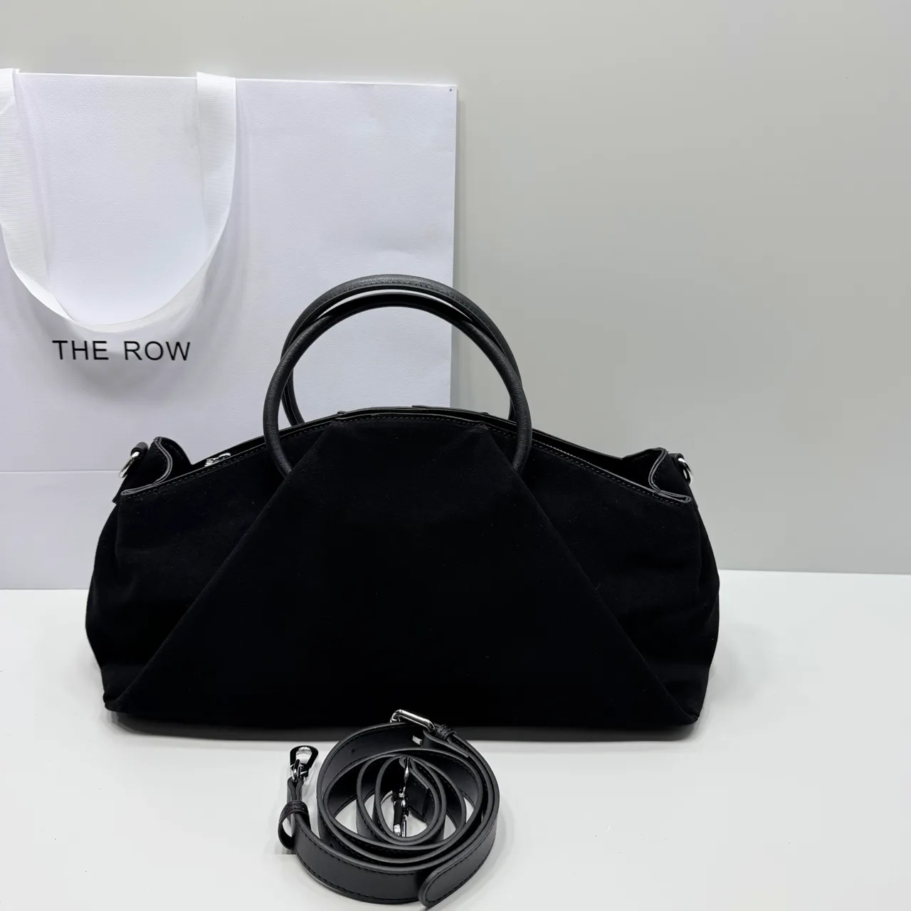 The Row Top-Handle Bag in Black · view 1