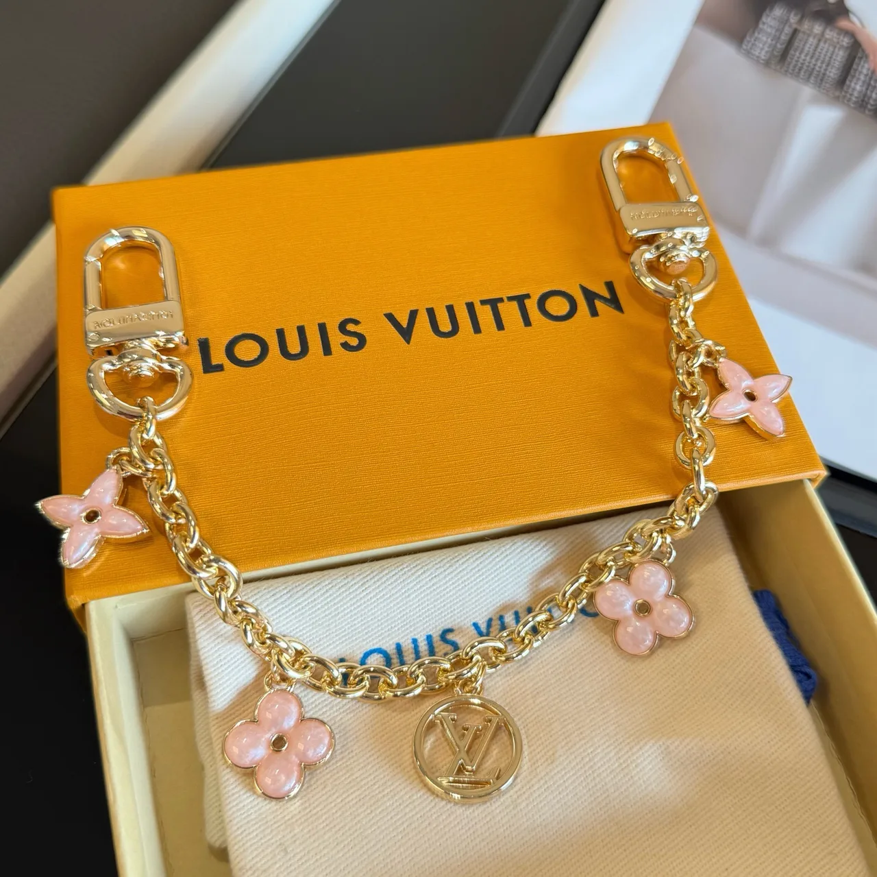 Louis Vuitton Glossy Flower Chain Bag Charm in Gold · view 1