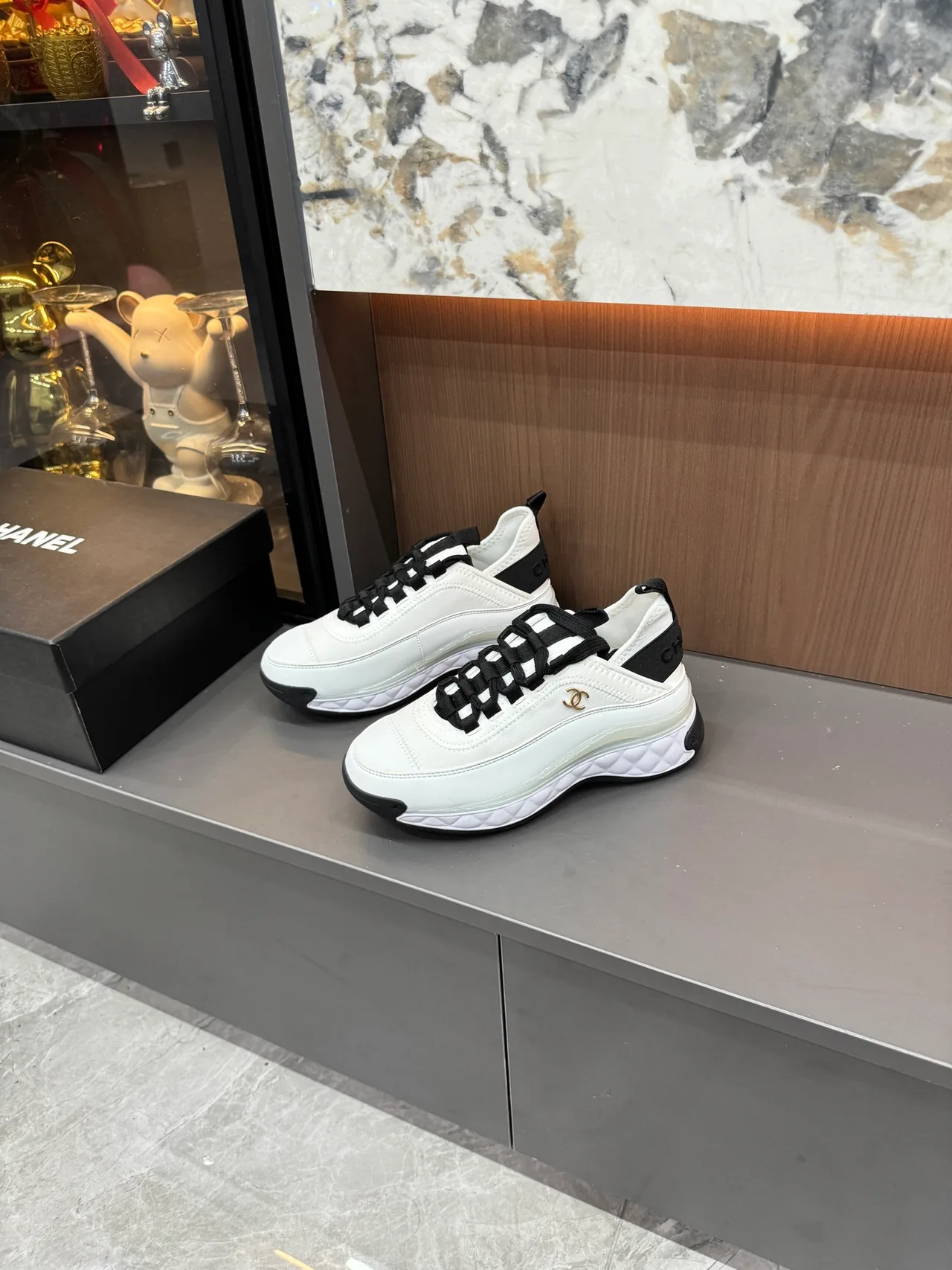 Chanel Cowhide Quilted Lace-Up Sneakers in White · view 2