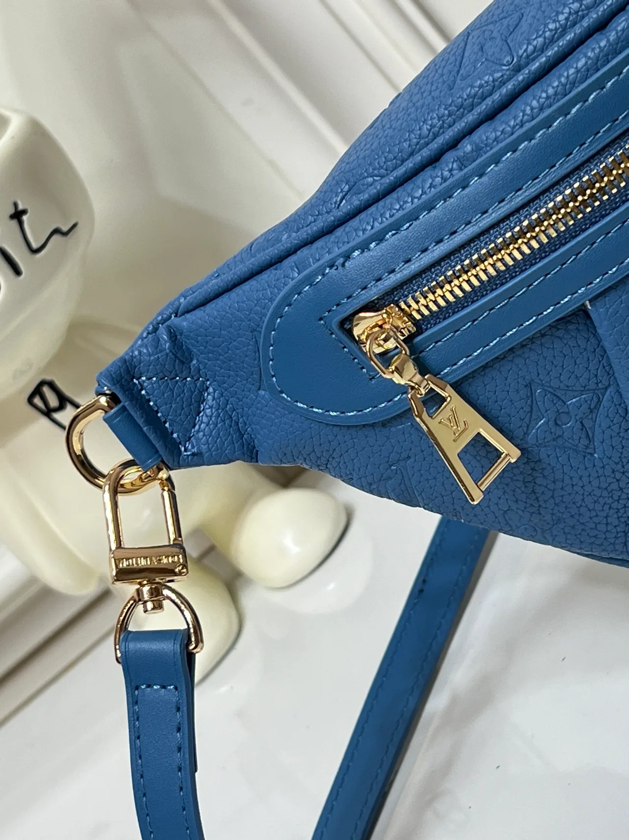 Louis Vuitton Leather Embossed Belt Bag in Blue · view 7