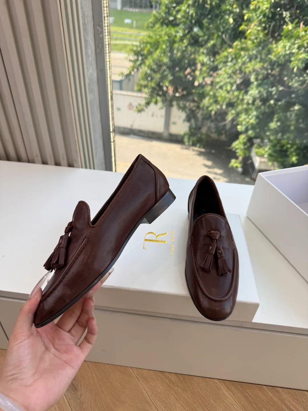 The Row Cowhide Glossy Round-Toe Tassel Loafers in Brown · view 5