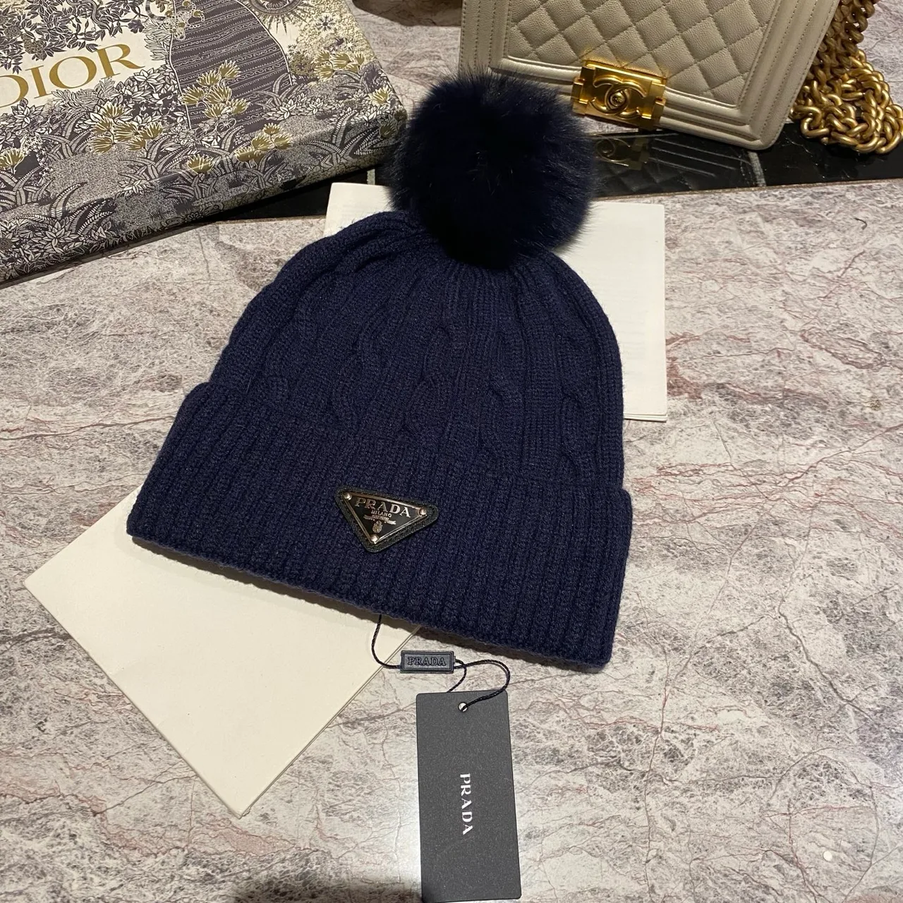 Prada Cable knit pom beanie in Black & White & Grey & Brown & Cream & Blue & Burgundy & Pink · view 6