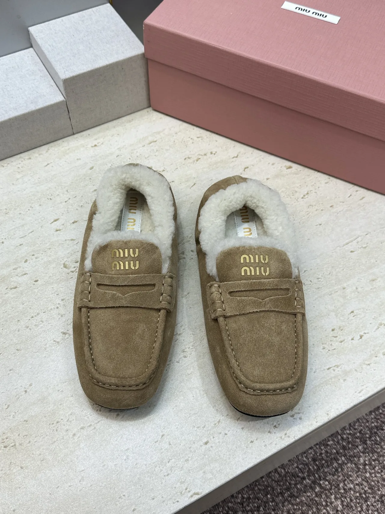 Miu Miu Round-Toe Slippers in Beige · view 2