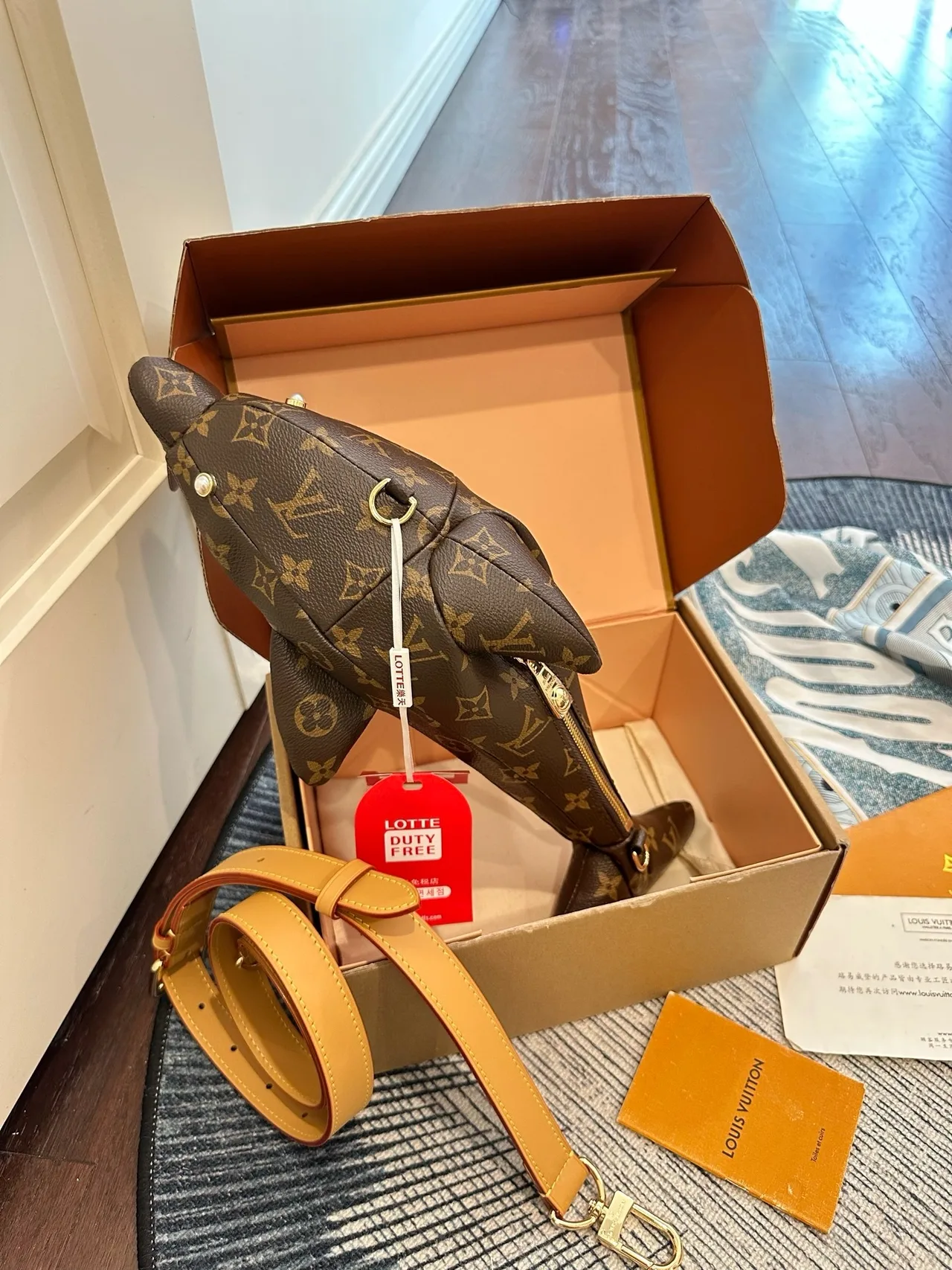 Louis Vuitton Dolphin-Shaped Bag in Brown · view 1
