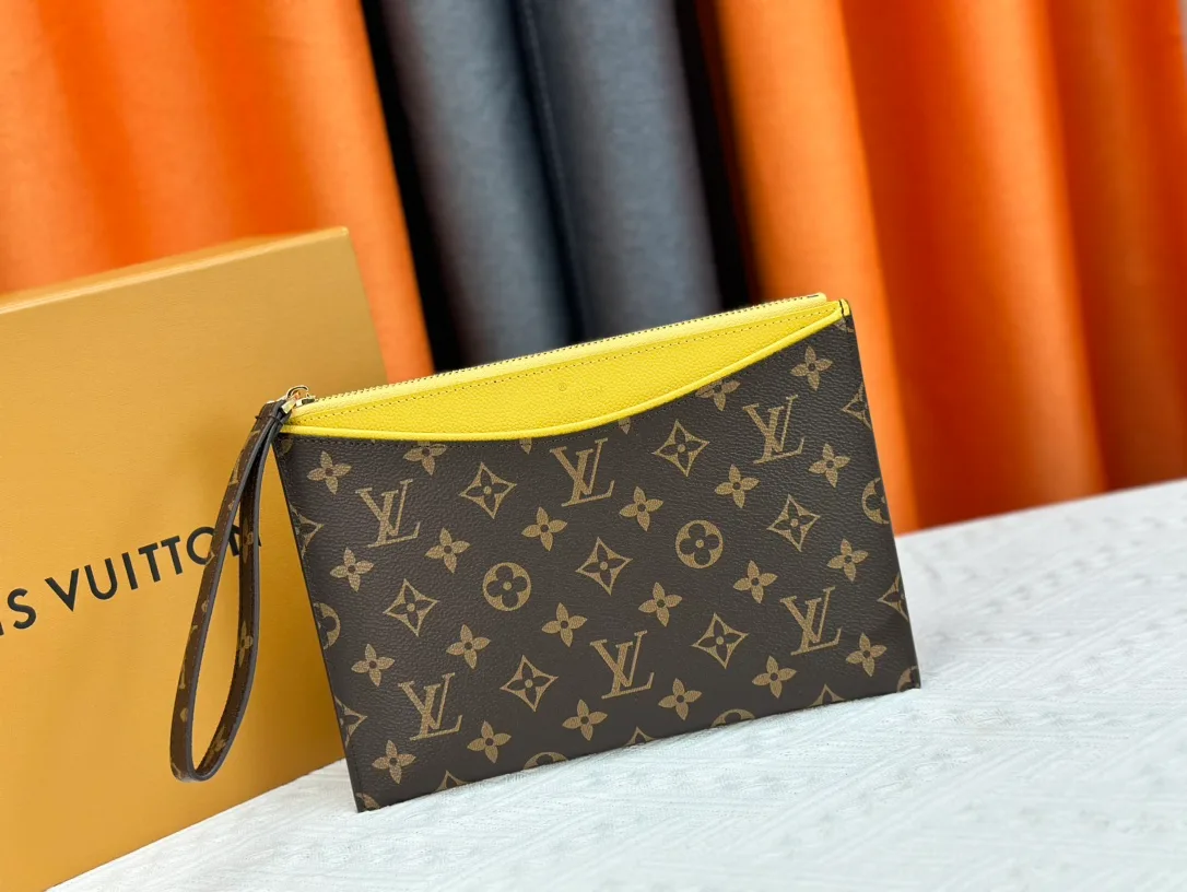 Louis Vuitton Calfskin Wristlet Pouch in Brown · view 1