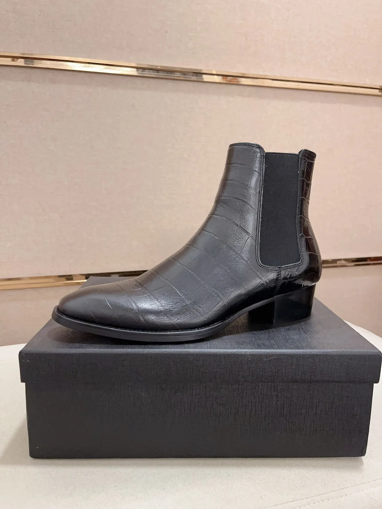 Saint Laurent Cowhide Glossy Pointed-Toe Ankle Boots in Black · view 1