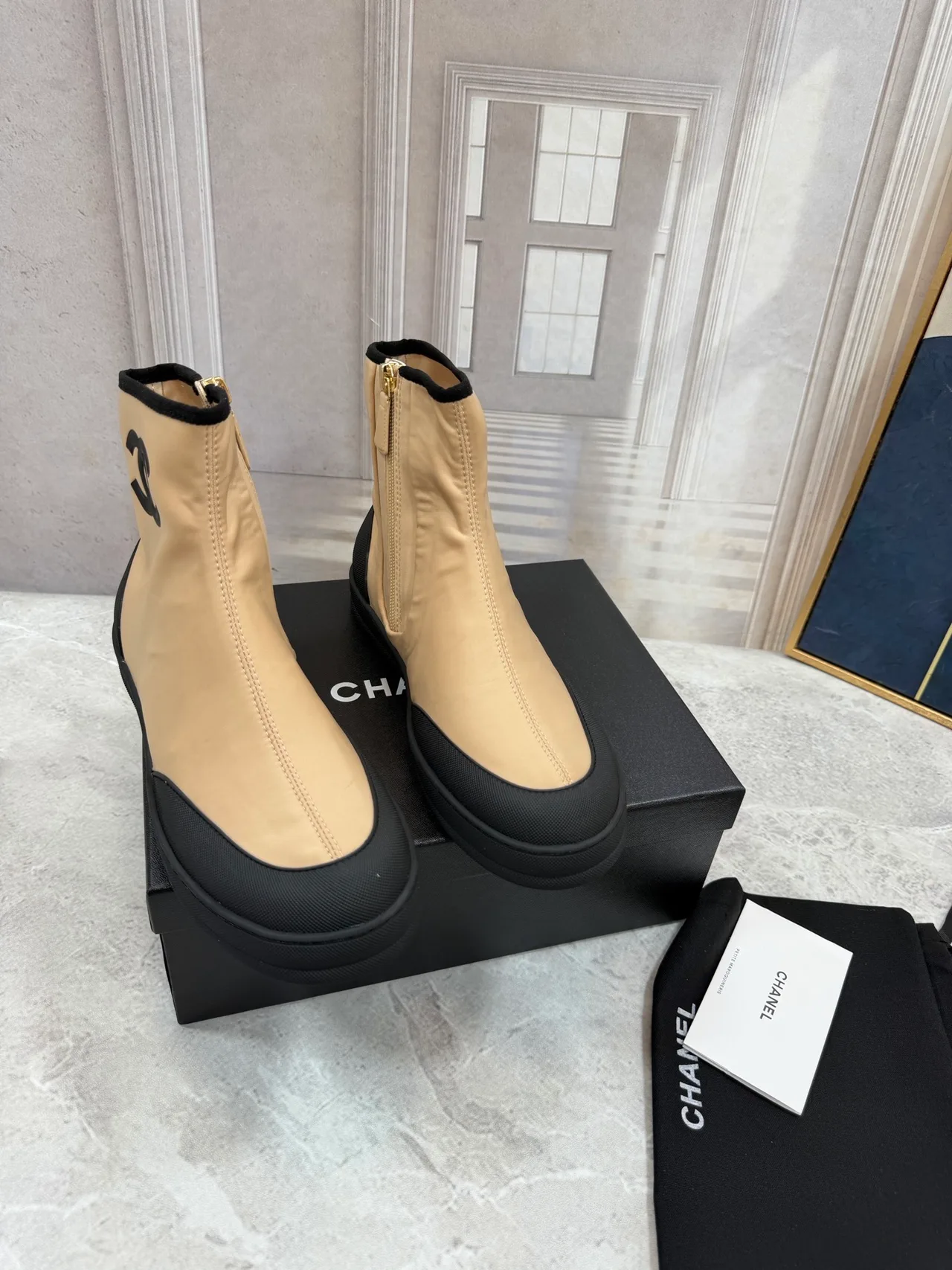 Chanel Cowhide Glossy Ankle Boots in Beige · view 1