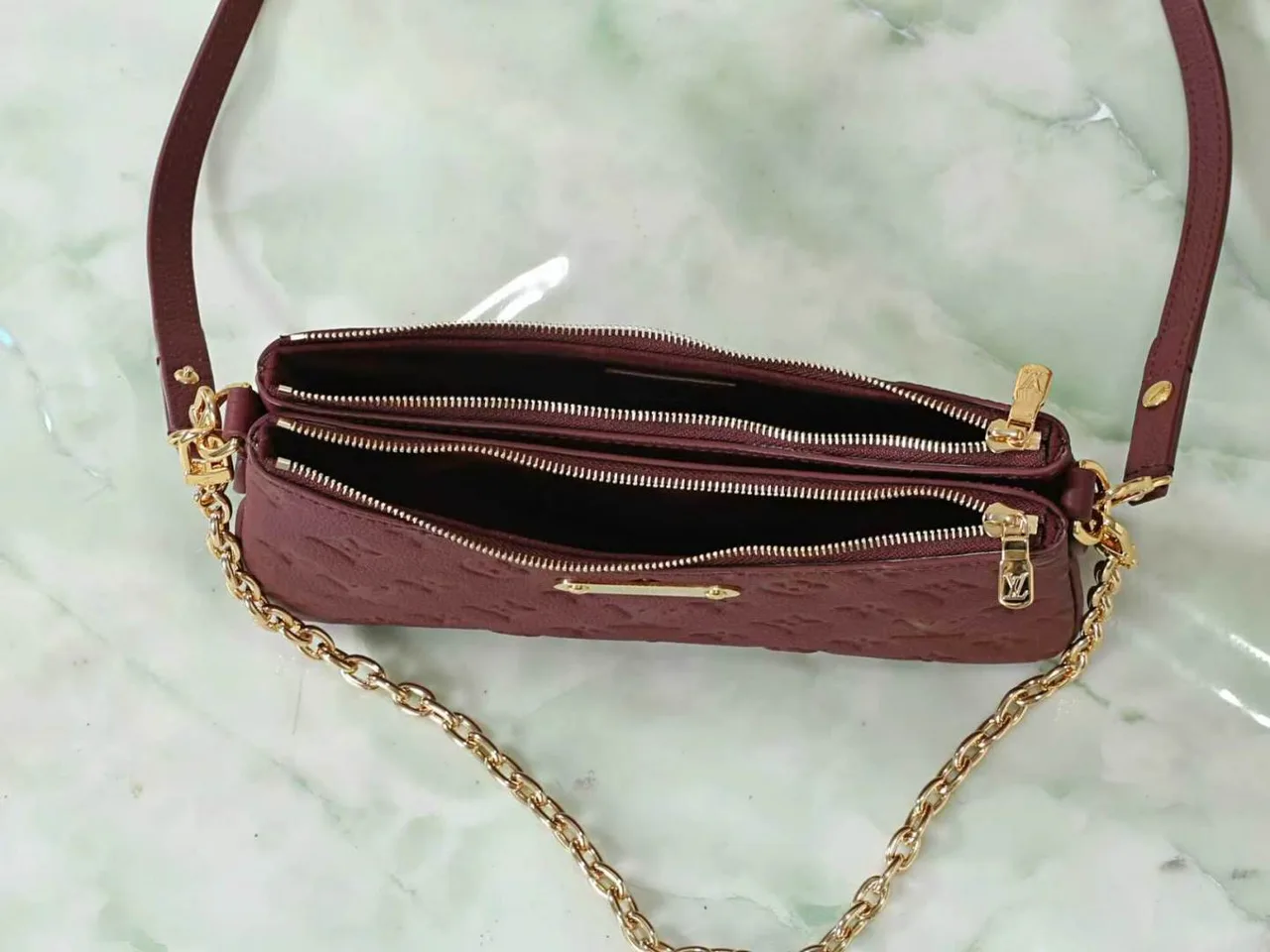 Louis Vuitton Leather Quilted Clutch in Burgundy · view 8