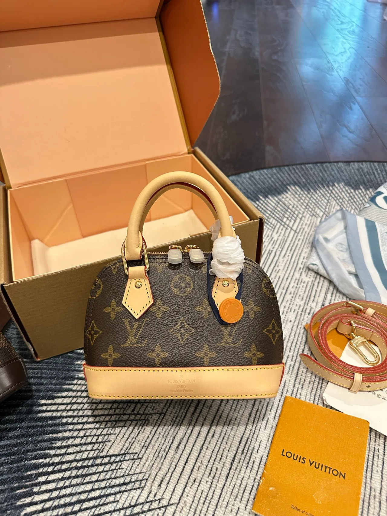Louis Vuitton Canvas Nano Alma Handbag in Brown · view 1