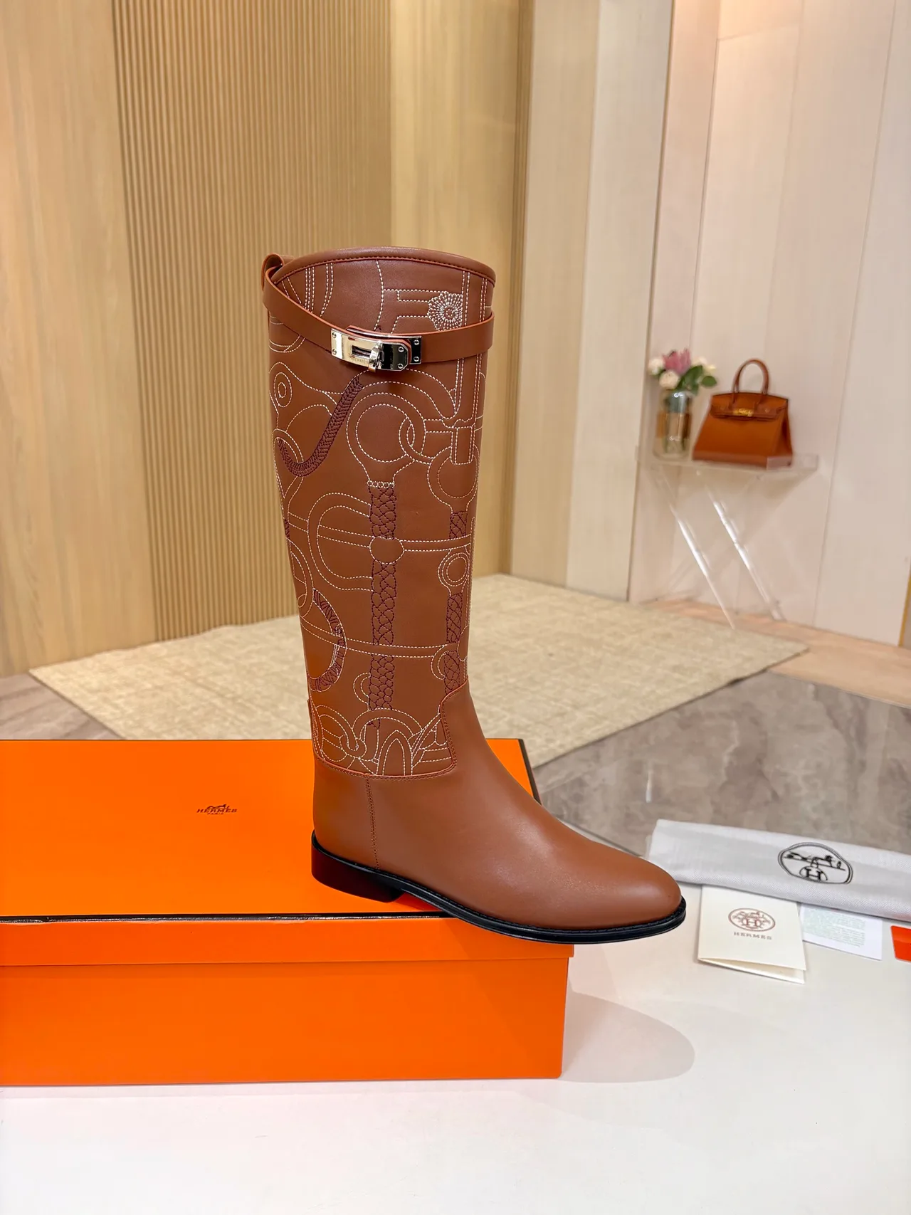 Hermes Cowhide Boots in Brown · view 1