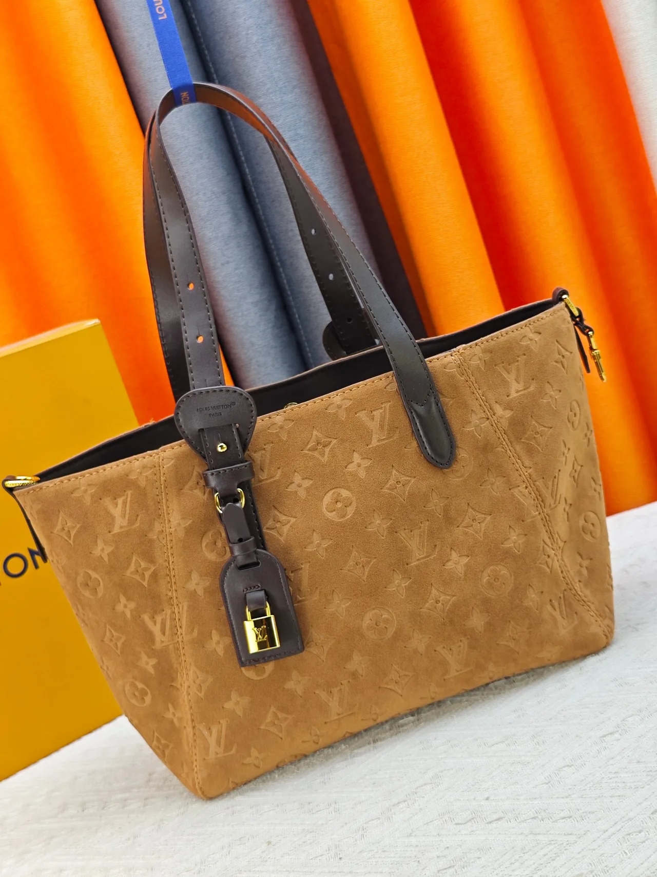 Louis Vuitton Cowhide Suede Monogram Tote in Tan · view 1