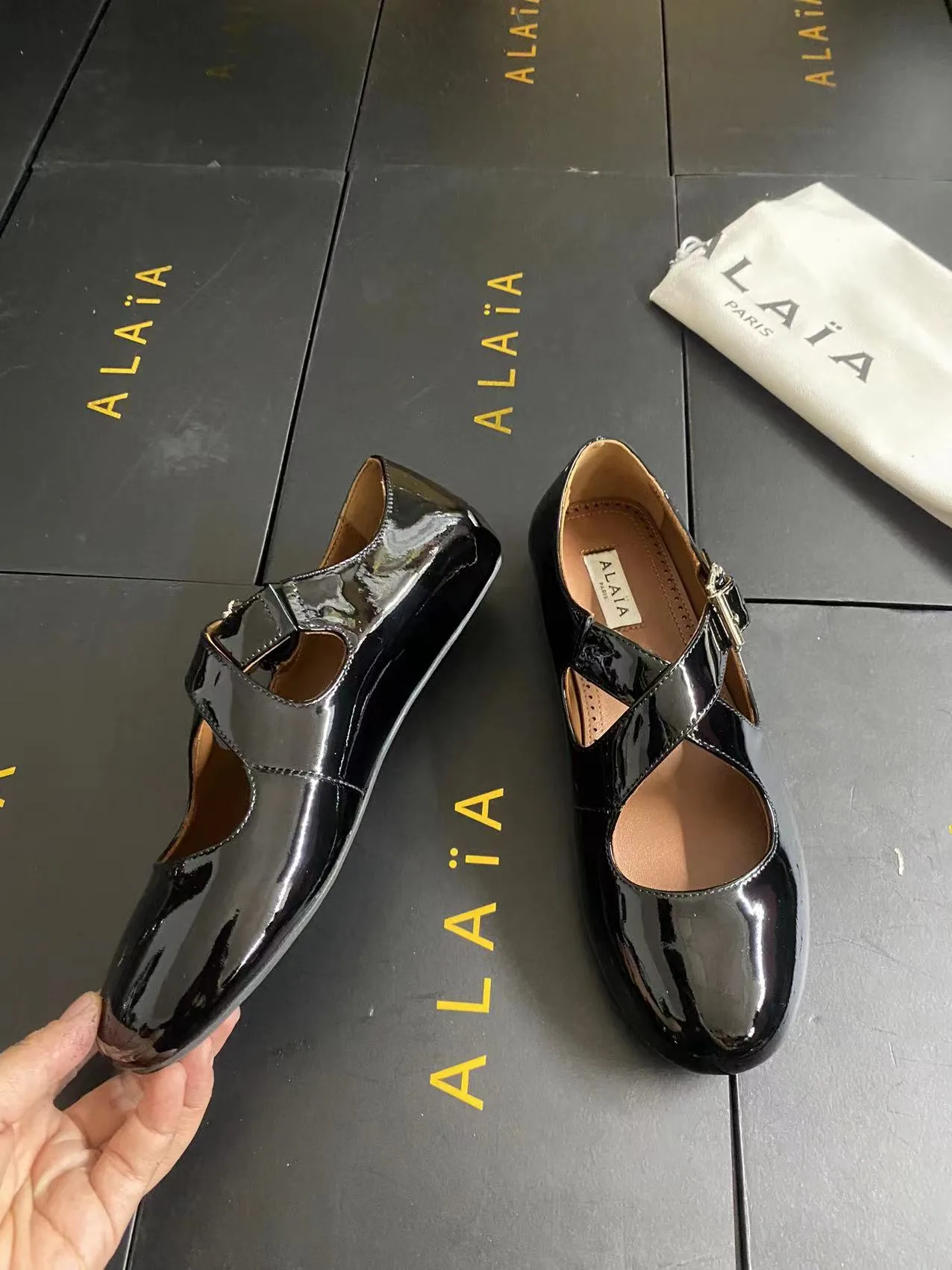 Alaia Cowhide Sheepskin Glossy Square-Toe Mary Jane Flats in Black · view 5