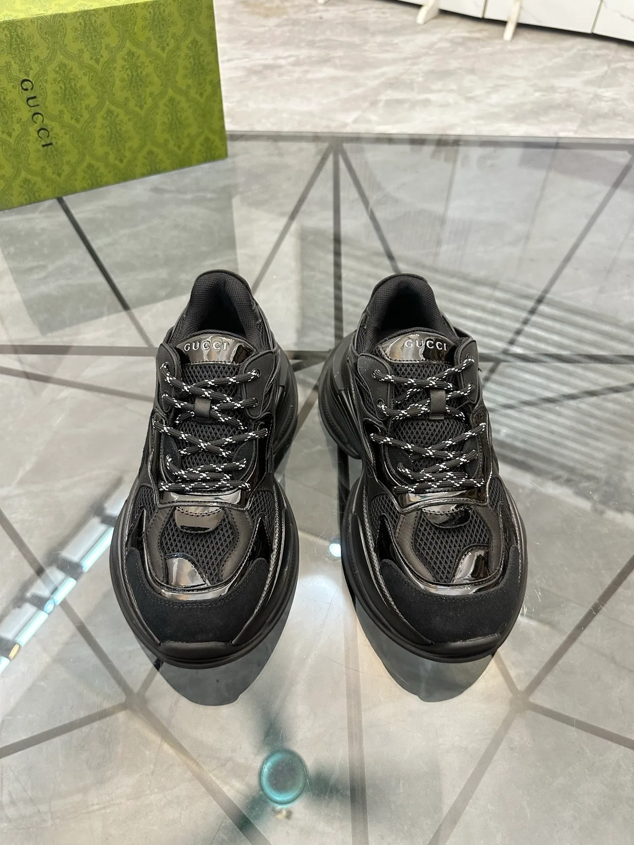 Gucci Cowhide Glossy Sneakers in Black · view 1