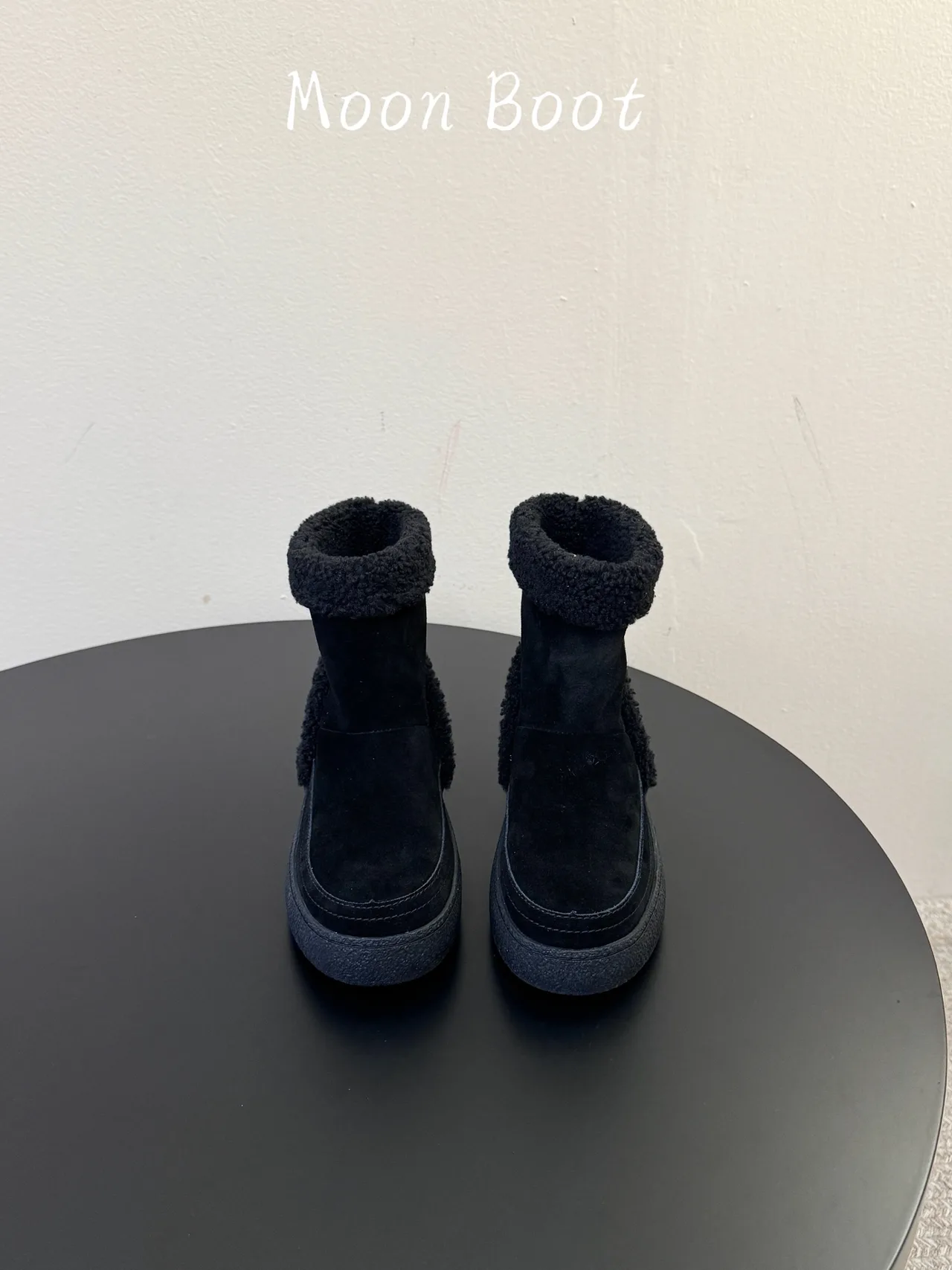 Moon Boot Cowhide Ankle Boots in Black · view 2