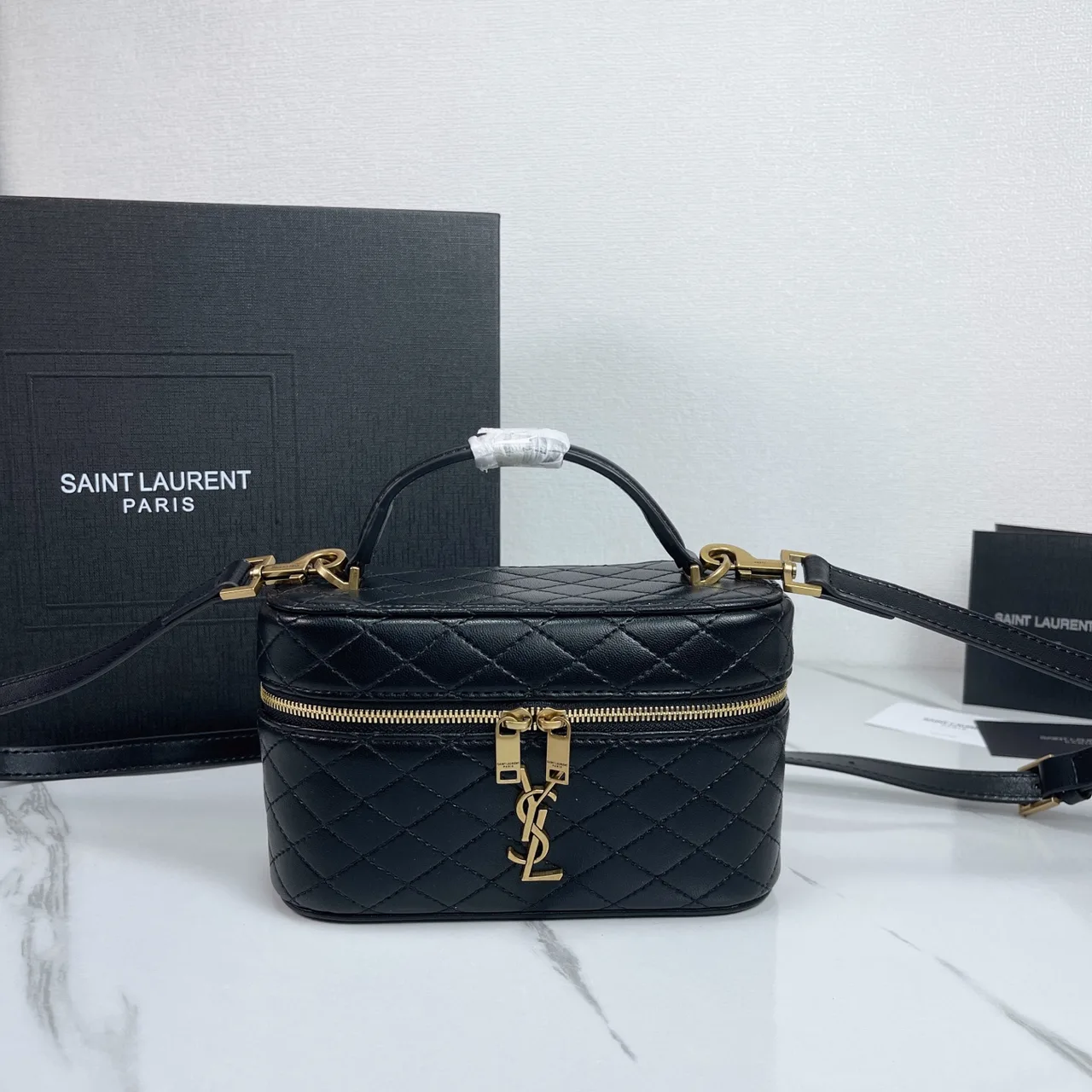 Saint Laurent Quilted Clutch in Black · view 1