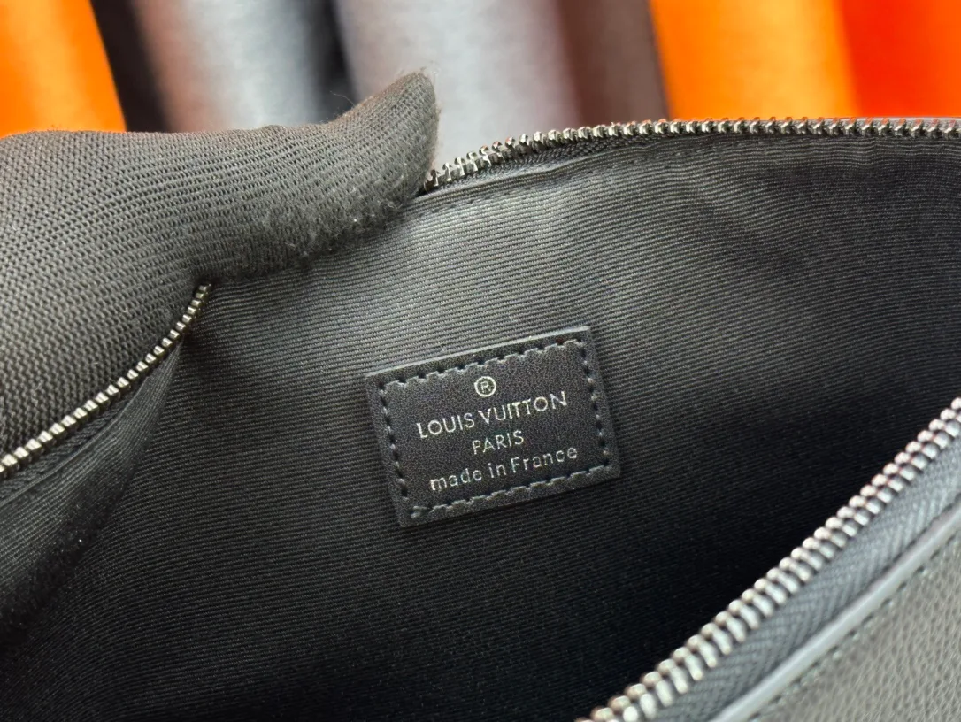 Louis Vuitton Cowhide Clutch in Black · view 8