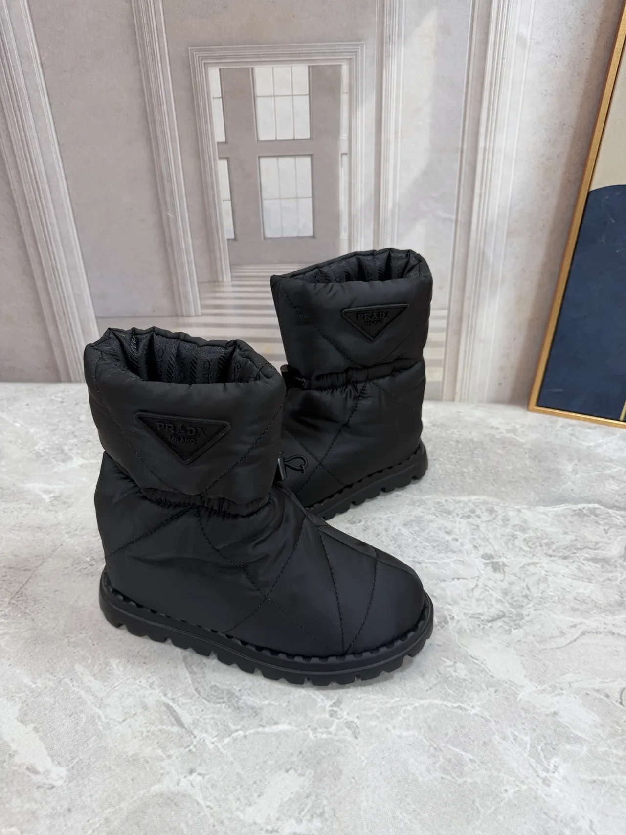 Prada Puffer Boots in Black · view 2