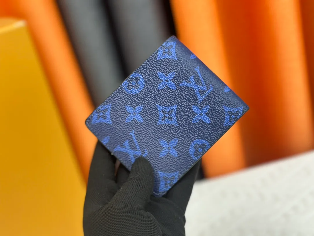 Louis Vuitton Canvas Monogram Wallet in Blue · view 3