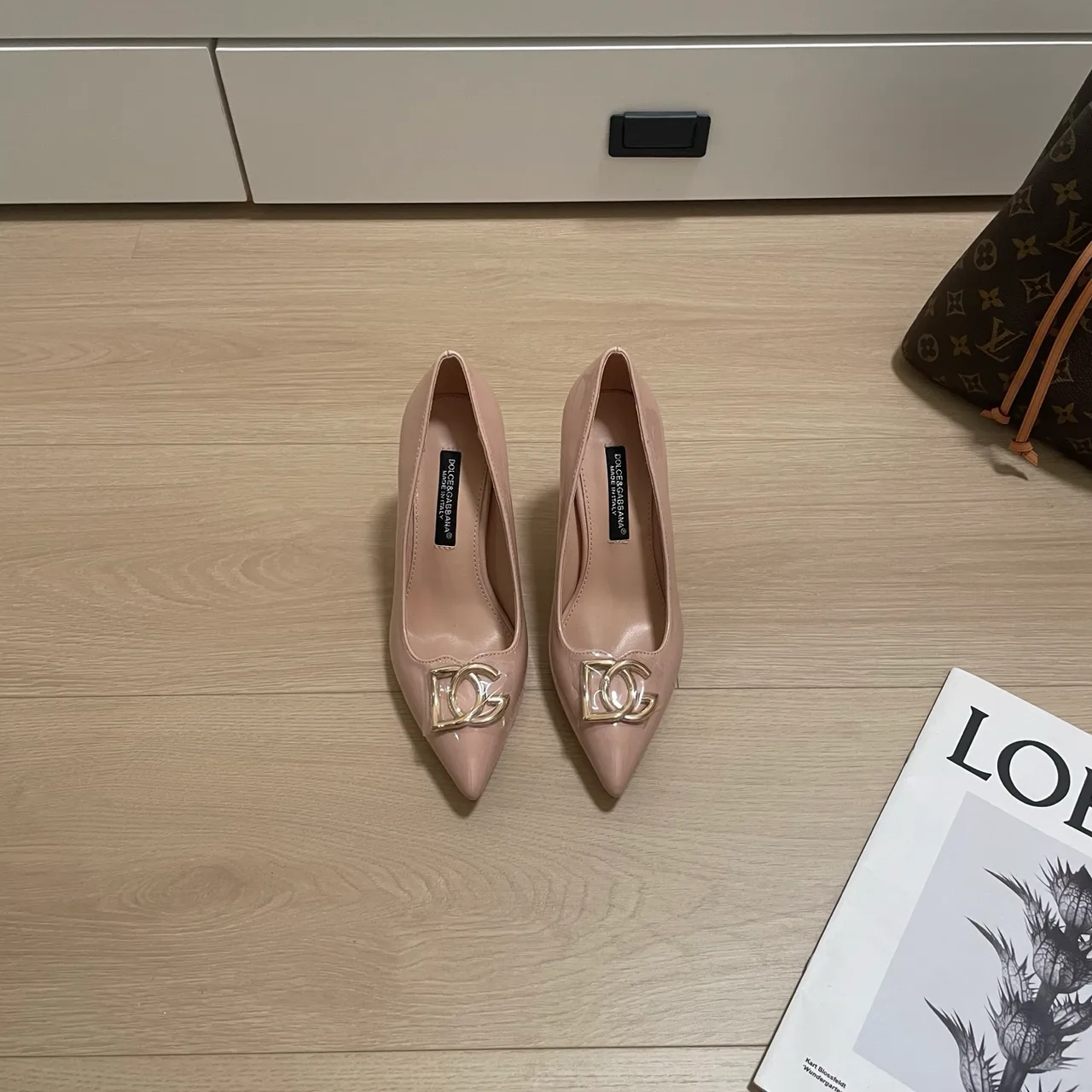 Dolce & Gabbana Sheepskin Patent Leather Glossy Pointed-Toe DG Pointed Heel Pumps in Pink · view 1