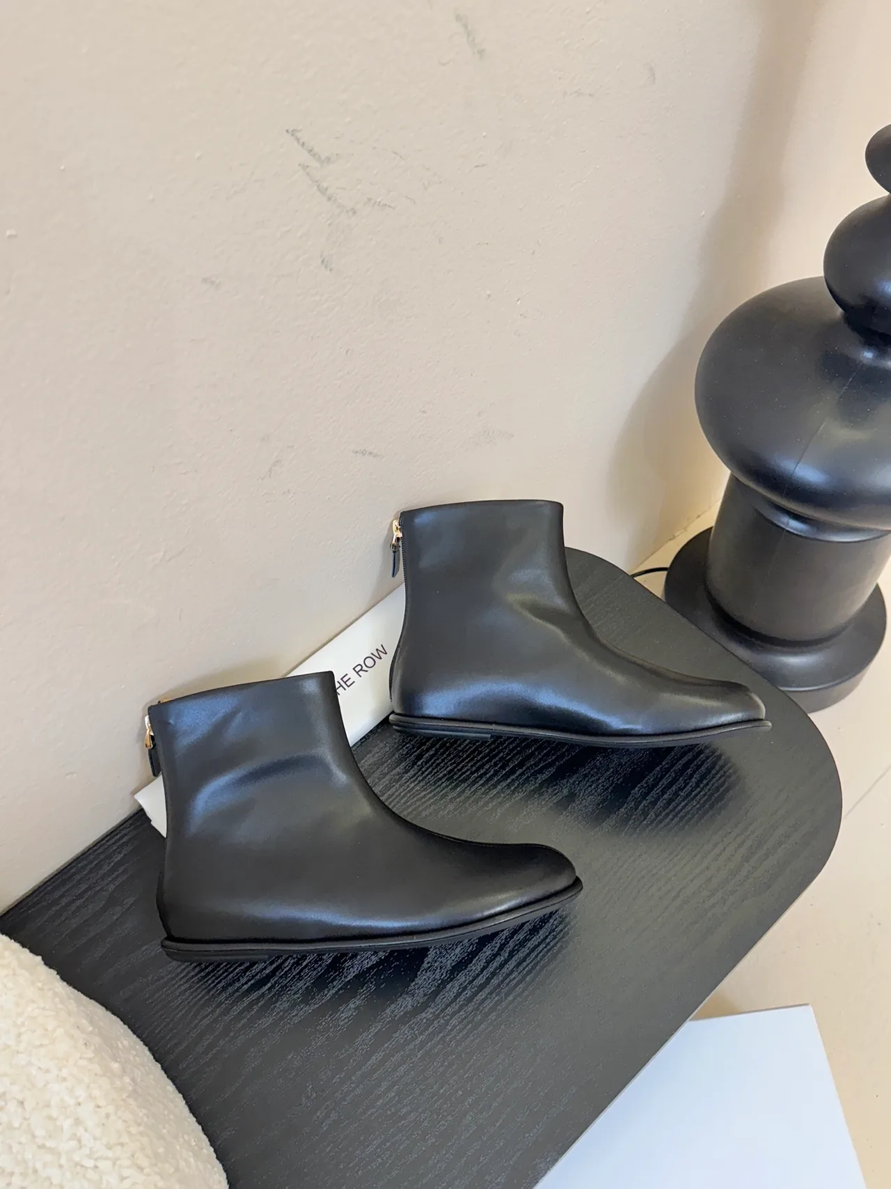The Row Cowhide Glossy Round-Toe Ankle Boots in Black · view 4
