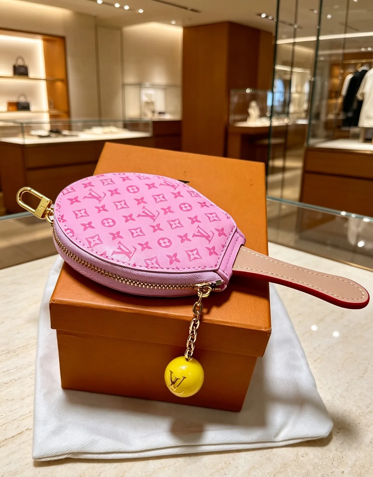 Louis Vuitton Racket-Shaped Coin Pouch in Brown & Red & Pink · view 3
