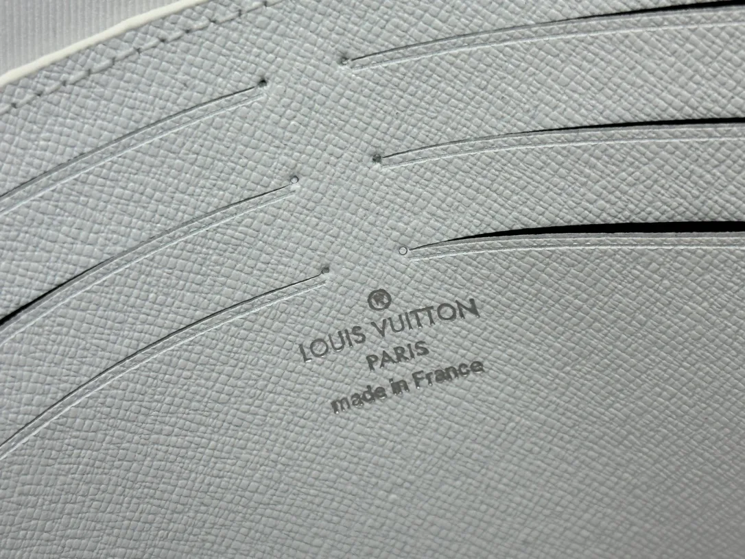 Louis Vuitton Cowhide Canvas Clutch in Green · view 8