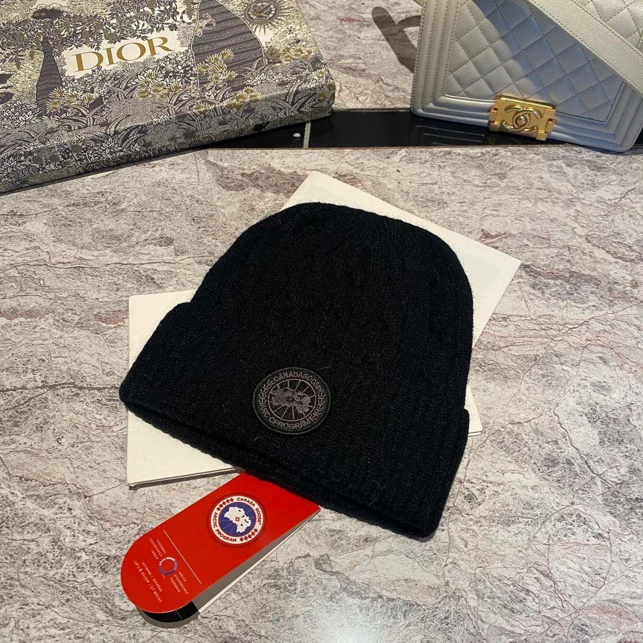 Canada Goose Cable-knit logo beanie in Black & Grey & White & Tan & Cream & Blue & Pink & Burgundy · view 1